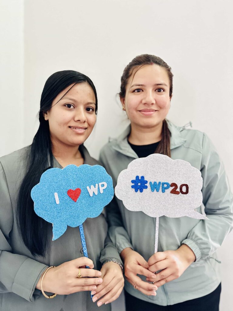 Employees of RWS taking photos with WP20 props